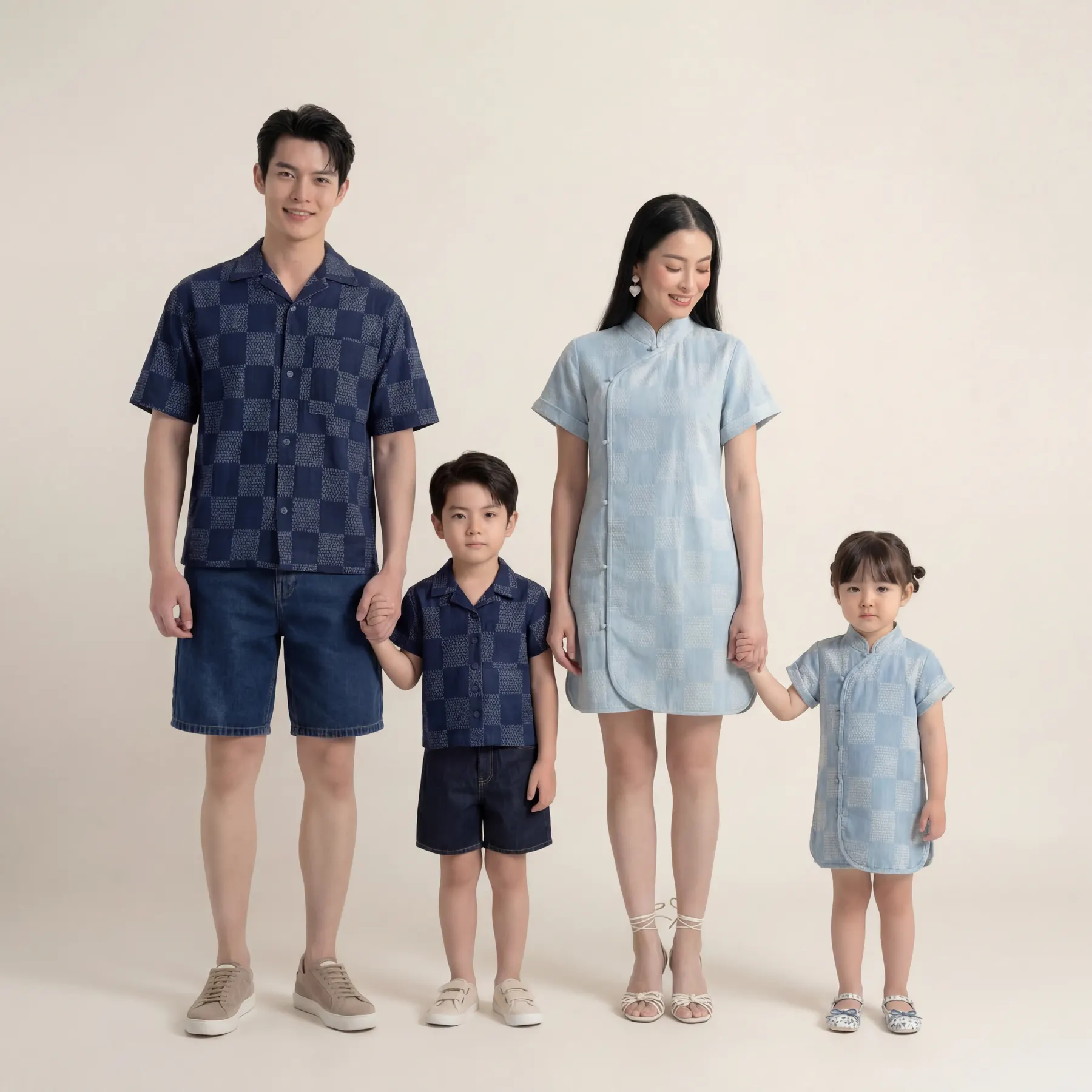 Family of four matching dark wash — AI family fashion photography