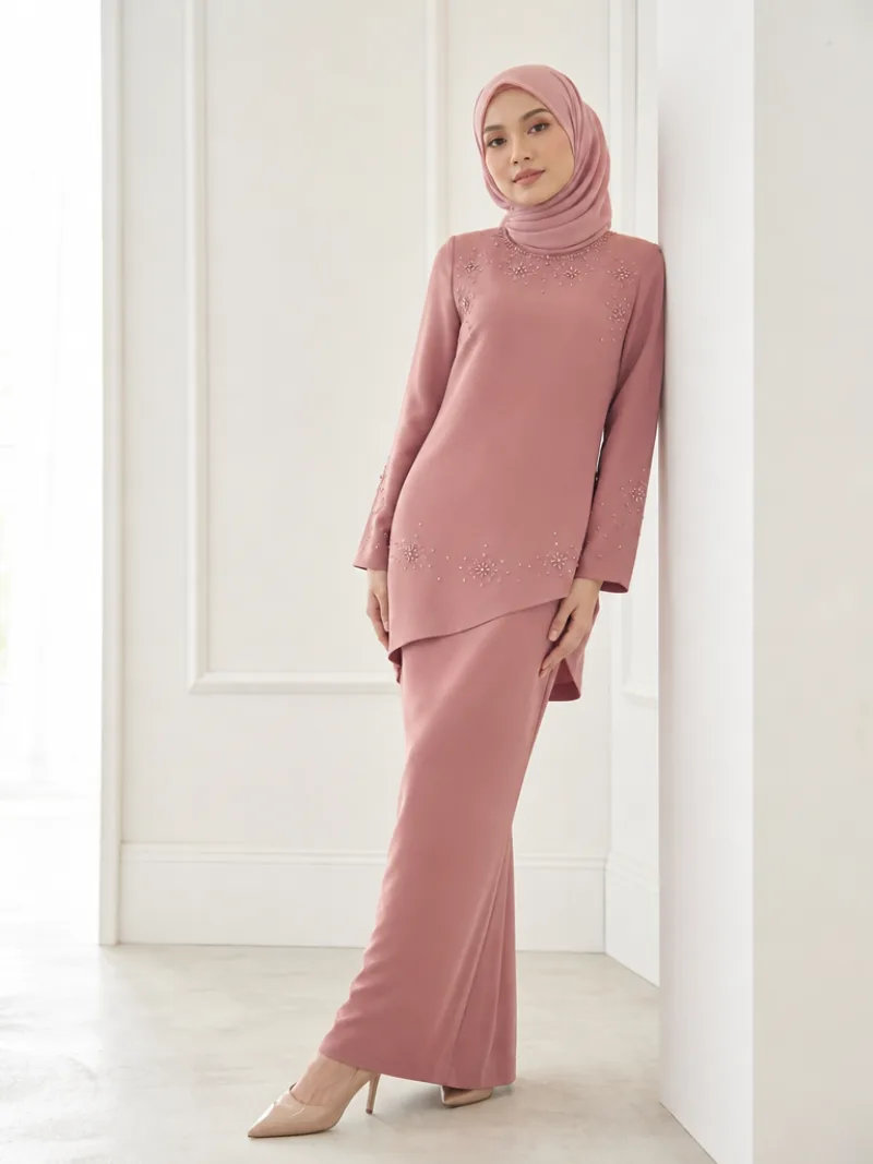 AI model in elegant dusty-rose modest fashion with hijab