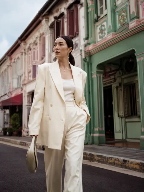 Model in a tailored blazer styled for an Asian market fashion campaign