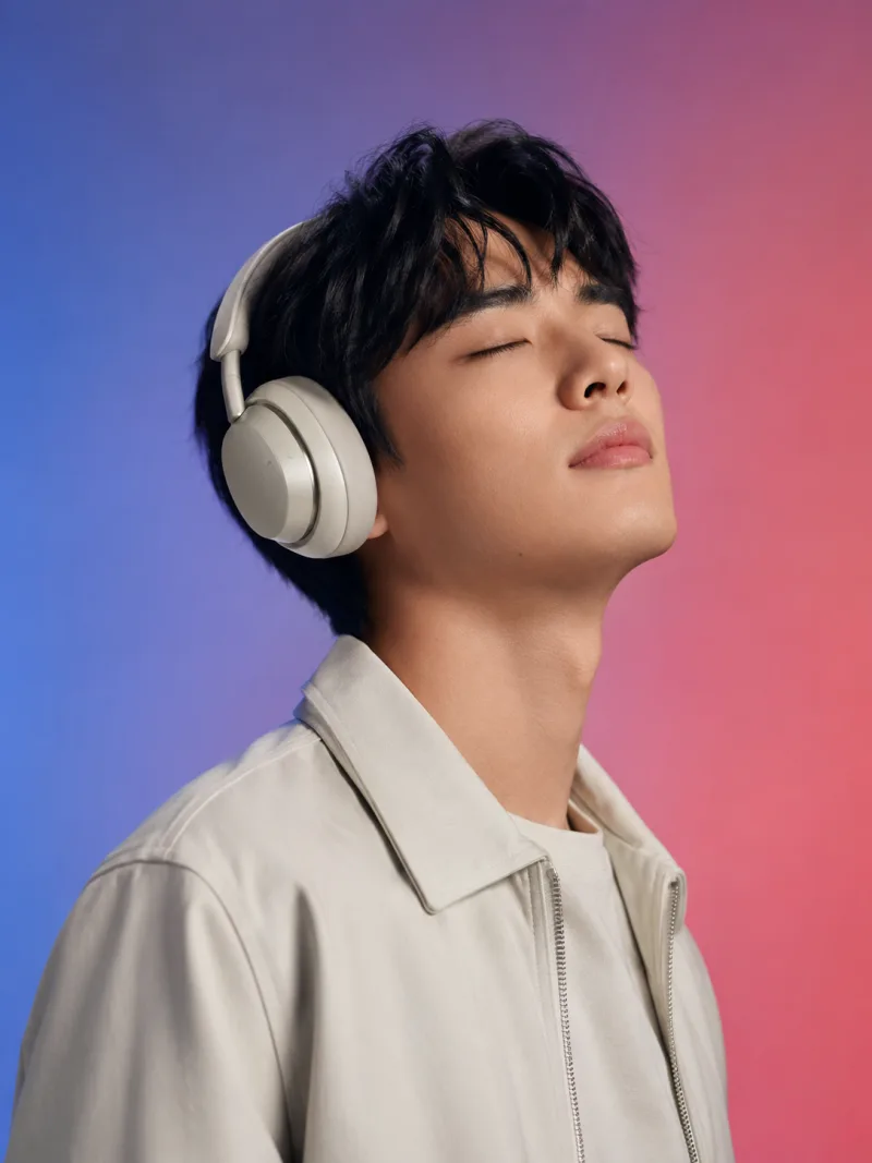 AI tech product campaign — model wearing wireless headphones